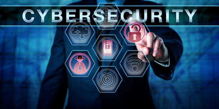 Security engineer is pushing CYBERSECURITY on an interactive virtual control screen. Computer security concept and information technology metaphor for risk management and safeguarding of cyber space.