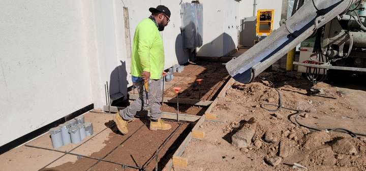 man preparing for concrete pouring