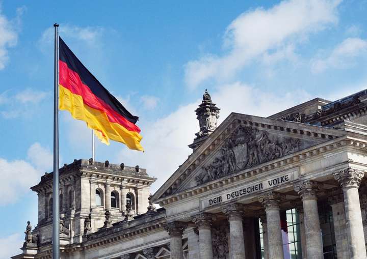 old building in Germany with flag in front