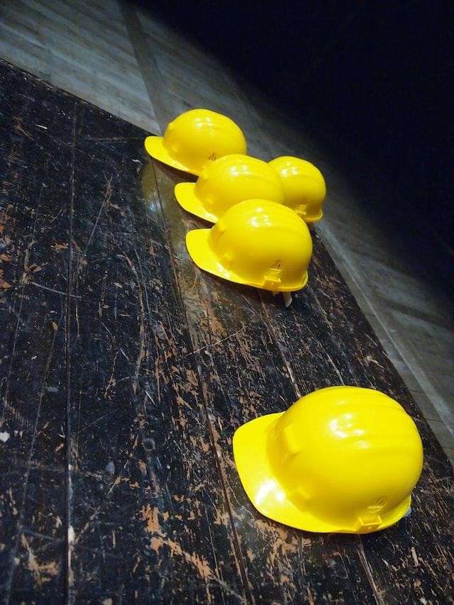 yellow construction helmets