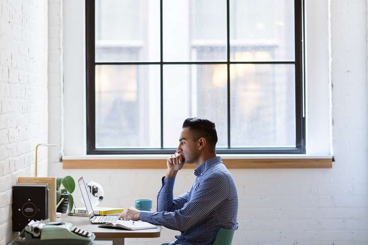 man working at computer